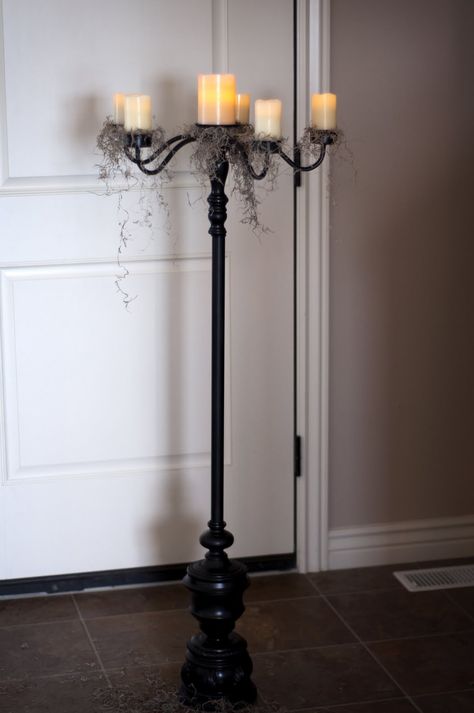 DIY :: When Hinges Creak: DIY Candelabra (yes that sucker is HOMEMADE!) It uses a candle chandelier (hanging candelabra) that has been taken apart & painted, PVC pipe & a lamp base for the bottom. AMAZING! | #floorcandle #candlestand Candle Chandelier Hanging, Diy Candelabra, Halloween Candelabra, Thrift Store Diy, Floor Candle, Pvc Pipes, Trendy Diy, Lamp Floor, Paper Scraps