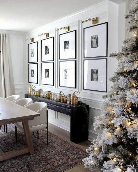 Photo Gallery Wall Behind Sofa, Picture Wall Ideas Above Sideboard, Photo Wall Console Table, Art Above Buffet Dining Room, Black And White Family Picture Gallery Wall, Pictures In Dining Room, Photos In Dining Room, Dining Room Photo Wall, Wall Side Table