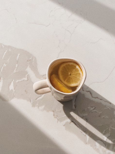 Lemon water, morning routine, yellow aesthetic, morning light, white kitchen aesthetic, white aesthetic, white marble Morning Habits Aesthetic, Simplify Aesthetic, Morning Rituals Aesthetic, Morning Mindfulness Aesthetic, Morning Ritual Aesthetic, Fasting Aesthetic Pictures, Fatigue Aesthetic, Hormones Aesthetic, Stillness Aesthetic