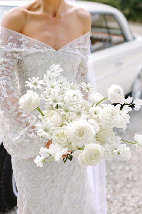 White wedding flowers and theme are always in style, no matter what season you choose to walk down the aisle. Such a pretty source of bridal bouquet inspiration and ideas! #whitewedding #whitebouquet Modern Bridal Bouquets, Highland Wedding, All White Wedding, White Wedding Bouquets, Cheap Wedding Dresses, Wedding Flower Inspiration, White Wedding Flowers, Lace Mermaid, White Bouquet