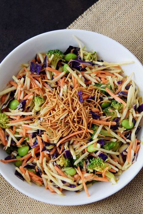 A great addition to your recipe book! This Asian Broccoli Slaw with Ginger Peanut Dressing will be a hit with the whole family. Slaw Dressing Recipe, Broccoli Slaw Dressing, Asian Broccoli Slaw, Ginger Peanut Dressing, Broccoli Slaw Salad, Asian Broccoli, Slaw Salad, Asian Dressing, Slaw Dressing