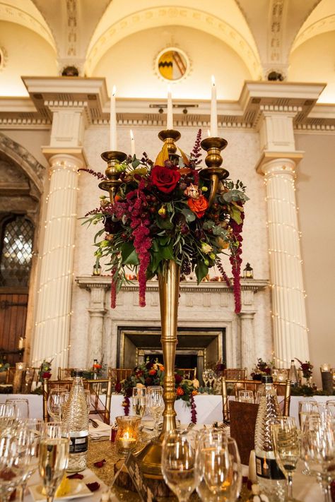 Autumn fall woodland bohemian fairytale wedding centrepiece flowers candelabra Candelabra Wedding Centerpieces Flowers, Fairytale Wedding Centerpieces, Centrepiece Flowers, Wedding Candelabra, Candelabra Flowers, Candelabra Wedding Centerpieces, Red Gold Wedding, Candelabra Wedding, Fruit Centerpieces