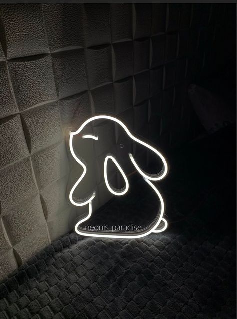 Cute bunny wall neon decor will make your interior bright and up to date. It will be amazing housewarming decor in your house. "Rabbit" Size:  310x260mm. 410x330mm. 510x410mm. 610x500mm. 710x570mm. *colors may be a little bit different from the photo or visualization. If you are interested in other sizes, shape / color of the backing, need an additional power cord or the stand, feel free to contact with us. Includes: LED-neon in transparent acrylic base with mounting holes, dimmer to change brig Theme Bapteme, Galaxy Room, Mini Rabbit, Neon Signage, Kids Room Sign, Birthday Ideas For Her, Neon Decor, House Rabbit, Bunny Decor