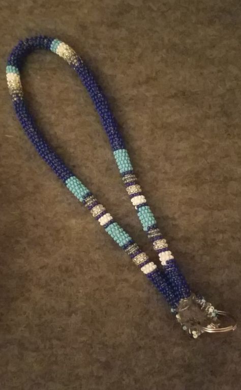 Blues, white, silver, metallic. #baseball #teamcolors #beading #beadedlanyard #wrist #blue #white #silver #metallic Blue Beaded Lanyard, Beaded Lanyard, Wrist Lanyard, Beaded Lanyards, Beaded Accessories, Craft Activities, Team Colors, White Silver, Lanyard