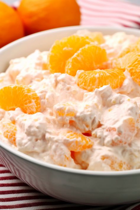 Orange Fluff Salad Mandarin Orange Fluff, Orange Fluff Salad, Orange Jello Salads, Pistachio Fluff, Orange Fluff, Fluff Salad Recipes, Strawberry Fluff, Fluff Salad, Sweet Whipped Cream