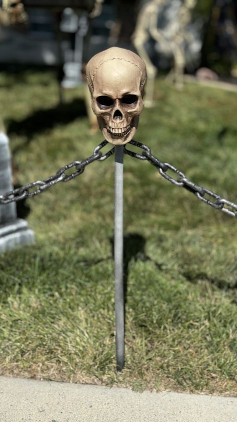 This DIY Dollar Tree Halloween Fence will transform your home into a haunted haven. Using affordable materials from your local Dollar Tree, this is a budget-friendly way to section off your yard and outdoor Halloween decor for spooky season. Every year we go big for Halloween and every year, I think about adding a fence … The post DIY Dollar Tree Halloween Fence appeared first on... Halloween Fencing Diy, Decorating Fence For Halloween, Diy Halloween Outdoor Decorations Easy And Cheap Di, Diy Halloween Yard Stakes, Dollar Tree Halloween Crafts Outdoor, Dollar Tree Halloween Chain, Chain Halloween Decor, Diy Halloween Decorations Graveyard, Halloween Chain Fence