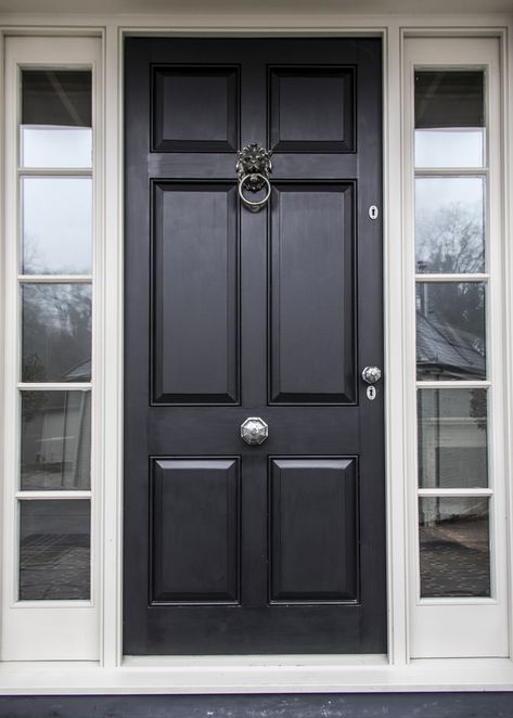 The exterior of your property should benefit from the same care and attention as the interior. Your front door welcomes family and guests and gives you an opportunity to reflect the style and feel within your home.  Our octagonal pewter knobs contrast brilliantly with the dark paint colour of this panelled door and the lion head door knocker in antique pewter finishes this classic look. Front Door With Door Knocker, Front Door With Knocker, Front Door Glass Panel, Dark Front Door, Navy Front Door, Apartment Front Doors, Front Door Black, Apartment Front, Pvc Doors