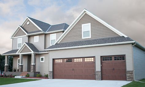 Raised Carriage Panel Door Dark Oak with Windows Gray House With Wood Garage Doors, Grey House Brown Garage Door, Raised Panel Garage Doors With Windows, Wood Garage Doors Dark Gray House, Brown Garage Door With Windows, Oak Garage Doors, Brown Garage Door, Stamped Carriage House Garage Door, Oak Garage