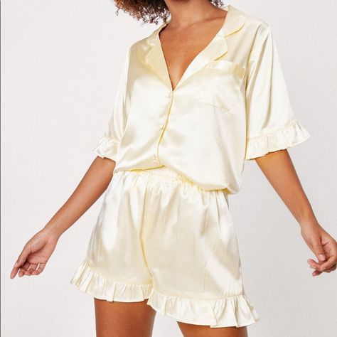 Brand New With Tags. Nasty Gal Satin Ruffle Pajama Shirt And Shorts Set. Color Is A Pale Yellow/Champagne. Perfect For Bridesmaids Or A Gift! Yellow Pajama Set, Wedding Pajamas Bridesmaids, Bridesmaids Pajama Set, Yellow Pjs, Wedding Pjs, Bridesmaids Pajamas, Bridesmaid Hair Inspo, Yellow Pajamas, Yellow Champagne