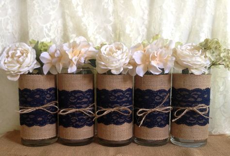 5 Navy blue burlap and lace covered glass vase, wedding, bridal shower, baby shower, home decoration by PinKyJubb on Etsy Blue Mason Jar Centerpieces, Lace Centerpieces, Unique Wedding Centerpieces, Wedding Centerpieces Mason Jars, Gold Mason Jars, Simple Bridal Shower, Winter Centerpieces, Jar Centerpieces, Blue Bridal Shower