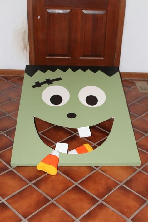 Frankenstein bean bag toss game. Bean Bag Toss Halloween, Halloween Bean Bag Toss Diy, Bean Bag Toss Game Diy Kids, Halloween Bean Bag Toss, Bean Bag Toss Game Diy, Bean Bag Game, Game Booth, Bean Bag Games, Haunted Woods