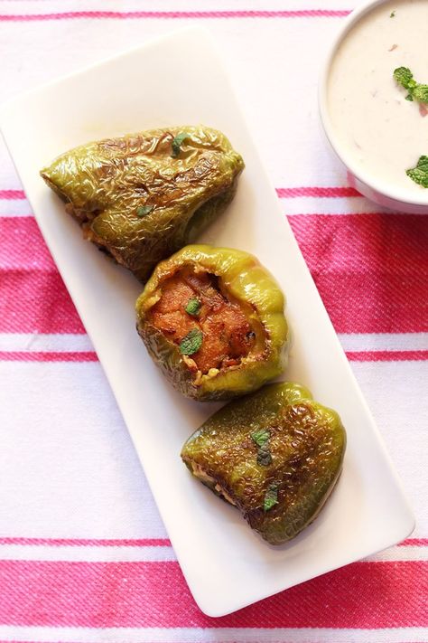 stuffed capsicum recipe with step by step photos. learn how to make bharwan shimla mirch recipe. capsicum is stuffed with spiced mashed potatoes. Capsicum Recipe, Stuffed Capsicum, Indian Vegetable Recipes, Capsicum Recipes, Veg Recipes Of India, Indian Dinner Recipes, Veggies Recipes, Indian Veg Recipes, North Indian Recipes