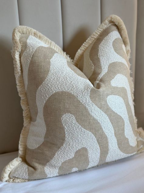 Introducing our 'Sigrid' cushion. A premium natural toned abstract pattern with cream fringe.  All of our cushions are handmade to order in the UK using designer, luxury fabrics. Available with or without premium duck-filled inners.  Please get in touch if you have any bespoke sizing or piping requests.  Lead time: All cushions are handmade to order so please bear with us at busy times. Our current lead time on all cushion orders is 3-4 weeks but we always endeavour to send them out sooner. Please get in touch if you wish to discuss our express charge. Samples: We understand that buying new cushions for your home is a big decision so we offer an £2.50 sample service. We recommend buying samples as we do not offer refunds or exchanges. Please get in touch to request fabric swatches.  Sizing Accent Pillows For Beige Couch, Pillow Ideas, Tuk Tuk, Handmade Cushion Covers, Small Cushions, Luxury Cushions, Handmade Cushions, Lifestyle Products, Cushion Design