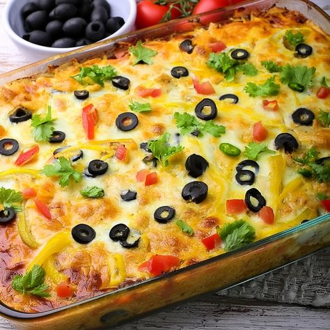 Indulge in the rich flavors of this delicious enchilada pie. Layered with seasoned ground beef, gooey cheese, and tangy enchilada sauce… Enchilada Pie Recipe Ground Beef, Enchilada Pie, Seasoned Ground Beef, Mexican Meals, Chimichurri Sauce, Mexican Food Recipes Easy, Gooey Cheese, Chicken Dishes Recipes, Enchilada Sauce