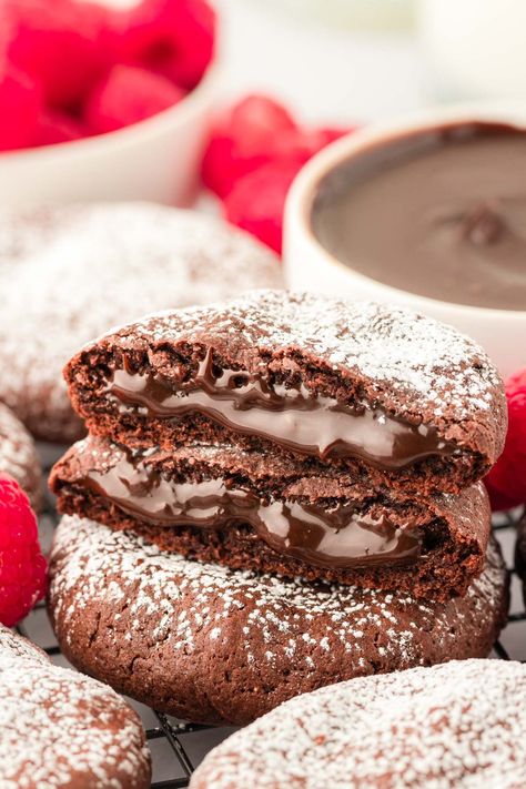 These Molten Lava Cookies are a Crumbl copycat recipe loaded with chocolate flavor and a gooey hot fudge center - pair it with vanilla ice cream for the ultimate dessert experience! Lava Cake Cookies, Molten Lava Cookies, Cookies Crumbl, Fudge Cookie Recipe, Crumbl Copycat, Oatmeal Fudge Bars, Lava Cookies, Chocolate Walnut Fudge, Molten Lava Cake