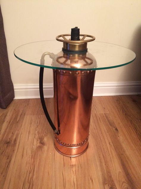 Vintage fire extinguisher  Glass top side table Firefighter Home Decor, Antique Booth Ideas, Steampunk Furniture, Firefighter Decor, Glass Top Side Table, Firefighter Apparel, Car Furniture, Steampunk Lamp, Pipe Lamp