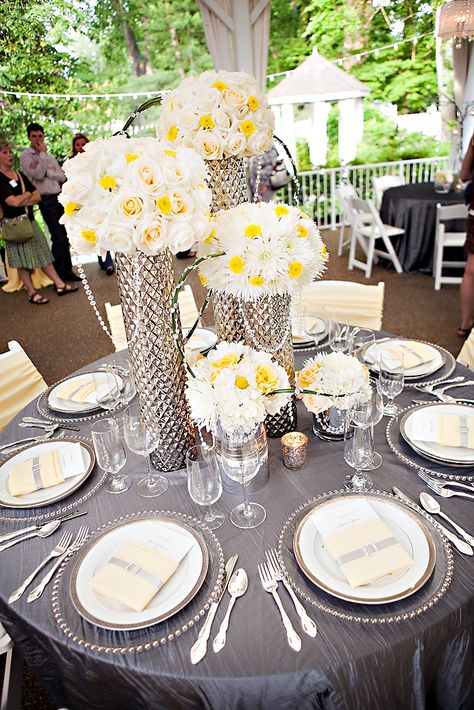 Garden Wedding Venue | Modern Reception Centerpiece by @Caprice Palmer | The Enchanted Florist | Grey Yellow and White - Photo: Phindy Studios Yellow White Silver Wedding Decor, Silver And Yellow Wedding, Yellow And Grey Wedding Decorations, Yellow White And Silver Party Decor, Yellow And Silver Party Decorations, Yellow And Silver Wedding, Yellow Wedding Centerpieces, Grey Wedding Decor, Yellow Centerpieces