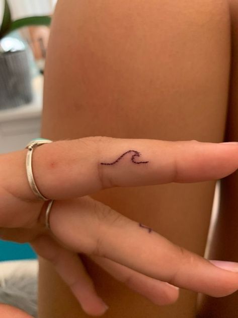 The 90 Most Popular Symbols For Travel Tattoos | Unique & Cute Travel Tattoo Ideas Easy Beach Tattoo, Beachy Stick And Poke, Simple Summer Tattoos, Wave Stick And Poke, Beachy Henna Ideas, Tiny Tattoos Beach, Stick In Poke Tattoo Ideas, Finger Stick And Pokes, Wave Tattoo Finger