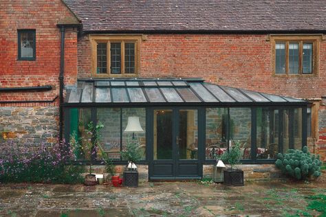 Tour a Surprisingly Cozy 21-Room House in Somerset, England Flagstone Floor, Backyard Goals, Modern Tudor, 4 Season Room, Sun Rooms, Limewash Paint, English Manor Houses, England Homes, Flagstone Flooring