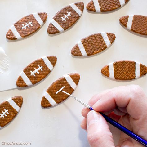 Wooden Biscuit Crafts, Wood Biscuits Crafts, Wood Biscuit Crafts, Football Garland, Making Garland, Chiefs Crafts, Wood Biscuits, Fall Diys, Football Crafts