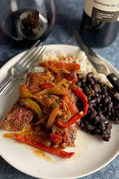 In this foolproof Mexican-style Steak Picado recipe simmers steak with onions, peppers and spices for a flavorful beef dish which will be delicious for dinner tonight served with rice and beans. Steak Picado Recipe Mexican, Steak Picado Recipe, Picado Recipe, Steak Picado, Mexican Food Recipes Beef, Sauteed Steak, Mexican Steak, How To Make Steak, Latino Food