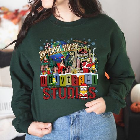 Universal Studios Christmas Shirt, Holiday At Universal 2023 Shirt, Family Christmas Vacation Shirt, Disney World Trip Tee,Hollywood Studios Check more at https://jerryclothing.com/product/universal-studios-christmas-shirt-holiday-at-universal-2023-shirt-family-christmas-vacation-shirt-disney-world-trip-teehollywood-studios/ Universal Studios Christmas, Universal Studios Jurassic Park, Christmas Vacation Shirt, Christmas Vacation Shirts, World Trip, Travel Tees, Disney World Trip, Hollywood Studios, Christmas Vacation