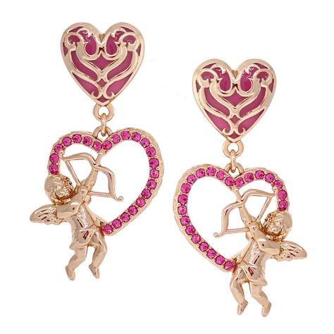 "Cupid"S Love" Pink Valentine Heart Earring By Ritzy Couture Deluxe " Rose Gold Plating Mesmerize The Hearts Of People With Our Pink Valentine Heart Earring! Plated With Rose Gold, This Heart Earring Is Part Of Our "Cupid"S Love" Collection And Is Designed For Those Who Want To Exude A Loving Aura That"S Bursting With Passion. Each Earring Weighs 9 Grams Each And You Can Select Your Order As A Post Or Clip. No Matter What You Choose, You"Ll Captivate The Hearts Of Many With An Original Style Tha Queen Of Hearts Jewelry, Cupid Accessories, Cupid Jewelry, Ca Cupid, Ethereal Jewelry, Cupid Love, Pink Heart Earrings, Heart Earring, Heart Accessories