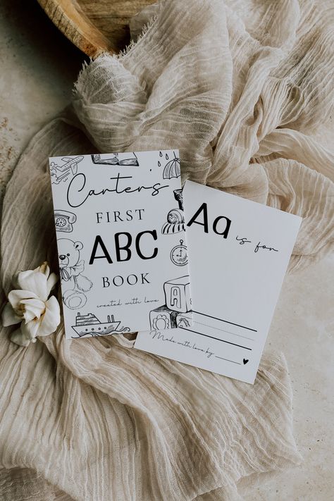 Baby's First Alphabet Book, Baby Abc Book, Book Minimalist, Fun Shower Games, Abc Game, Abc Games, Game Template, Abc Book, Minimalist Baby