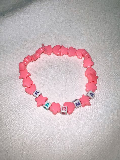 Pink beaded karma friendship bracelet from eras tour Pink Friendship Bracelet, Taylor Swift Eras Tour, Taylor Swift Eras, Bracelet Beaded, Pink Bracelet, Friendship Bracelet Patterns, Eras Tour, Friendship Bracelet, Beaded Bracelet