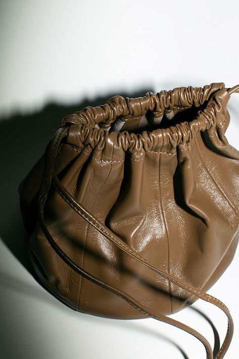 Paneled bucket bag with flat seamed details. Drawstring top that cinches shut and long slim crossbody straps. 6" diameter base, 8" tall with 20" strap drop. Unlined Italian leather. Modern Weaving, Bucket Bags, Drawstring Top, Unique Bags, Leather Bucket Bag, Leather Bucket, Square Bag, Custom Items, Italian Leather