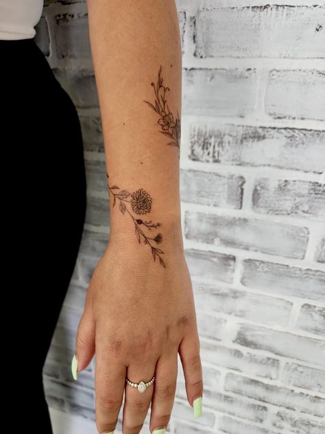 Lady bug birthflower vine wrap Flowers And Ladybug Tattoos, Birth Flower Vine Tattoos, Flower On Suit, Ladybug On Flower Tattoo, Ladybug Flower Tattoo, Flower Lady Tattoo, Flower Wrist Tattoo, Flower Vine Tattoos, Wrap Around Wrist Tattoos