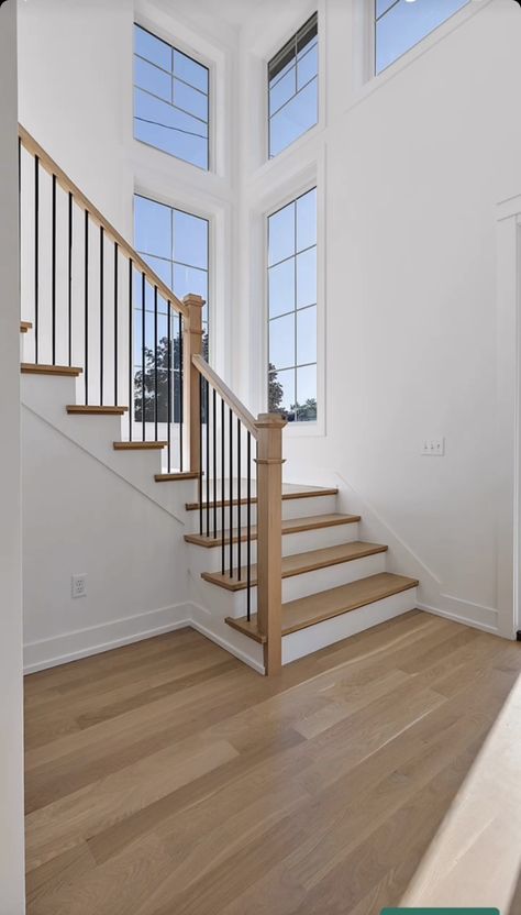 3 Floor Staircase, Narrow Loft Stairs, Split Landing Staircase, Stairs Over Doorway, House Entrance Hall Ideas, Open U Shaped Staircase, Staircase By Front Door, Transitional Modern Staircase, Where To Put Stairs In A House