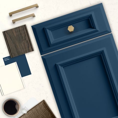 Navy Blue painted Dura Supreme cabinetry. Shown in St. Augustine door style in Sherwin Williams (SW 9177) Salty Dog paint. Featuring Bianco Drift from Caesarstone countertop. #moodboardmadness #SWColorLove Sw Salty Dog, Salty Dog Paint, Navy Blue Paint, Blue Cabinet, Caesarstone Countertop, Navy Blue Kitchen, Navy Kitchen, Blue Kitchen Cabinets, Kabinet Dapur