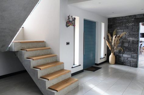 Seanua House on Instagram: “This is our front hall. It’s such a simple space, where we’ve let the different materials used do all the talking - concrete stairs, glass…” Concrete Stairs Indoor, Stairs Indoor, Microcement Walls, Limestone Cladding, Wood Front Door, Solid Wood Front Door, Making A Decision, Wood Parquet Flooring, Mexico House