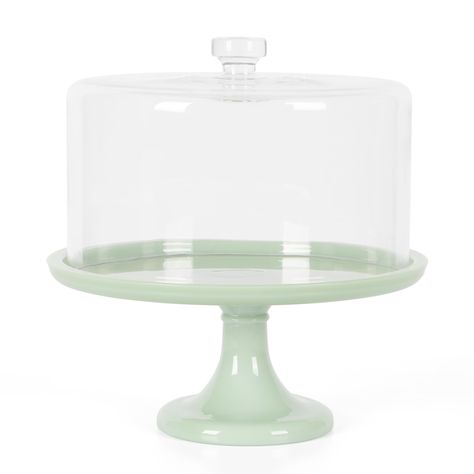 PRICES MAY VARY. A COMPLETE SET INCLUDES: One handmade jadeite cake stand that measures 10.2 x 4.7 inches and one 9.45-inch glass dome. HANDMADE JADEITE MILK GLASS : A lovely cake stand handcrafted from jadeite milk glass to display cakes, pies, a stack of cookies or cupcakes, and more WHIMSICAL SERVING PIECE: Subtly raised rim draws the eye to the delicious culinary creation staged on the stand's wide pedestal. Elegantly coated with a delicate shade of green and a high-gloss finish, this servew Jadeite Kitchen, Modern Cake Stand, Milk Glass Cake Stand, Cake Stand With Dome, Green Glassware, Interior Design Advice, Glass Cakes, Cake Display, Cake Stands