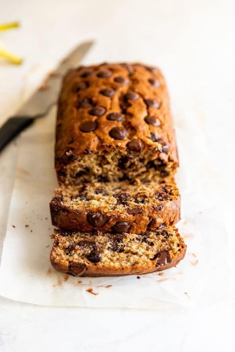 Super Moist Chocolate Chip Banana Bread | A Sassy Spoon Moist Chocolate Chip Banana Bread, Chocolate Chip Banana Bread Recipe, Moist Banana Bread, Chocolate Chip Banana, Best Banana Bread, Chocolate Banana Bread, Chocolate Chip Banana Bread, Chocolate Chip Recipes, Banana Chocolate Chip