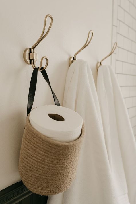 Our whole bathroom renovation was inspired the original subway tiles, anthropologie brass hardware, and vintage green paint! Look how I styled it with a woven basket from Amazon Home and a set of spa towels by casaluna. Vintage Green Paint, Bathroom Wall Baskets, Anthropologie Towels, Bathroom Budget, Bathroom Towel Holder, Towel Holder Bathroom, Wall Basket, Spa Towels, Subway Tiles