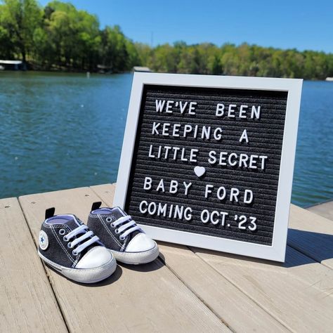 Baby shoes. Letter board. Lake. Announcement. Pregnancy. We're having a baby! Lake Baby Announcement, Baby Board Announcement, Lake Pregnancy Announcement, Pregnancy Announcement Board, Baby Announcement Board, Pregnancy Announcement Letter Board, Letter Board Baby Announcement, Letter Board Pregnancy Announcement, Summer Pregnancy Announcement