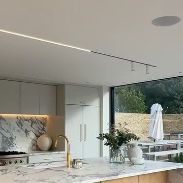 The Luxury Home Show on Instagram: "A look at this beautiful light-filled kitchen with its open-plan layout @project_castle_combe 🪵 The standout feature is the gorgeous marble waterfall island, imagine waking up every day to enjoy breakfast with a view of the garden and pool… it’s a dream come true! • • #luxurylifestyle #luxuryhomes #luxuryhouses #luxuryhomesuk #housetours #theluxuryhomeshow #homeinsporation #homedesign #londonhomes #interiorsuk #housetours #wiltshire #wiltshirelife #wiltshirehome #cotswolds" Kitchen With Pool View, Marble Waterfall Island, Breakfast With A View, Waterfall Island, Castle Combe, Plan Layout, A Dream Come True, Beautiful Lights, Dream Come True