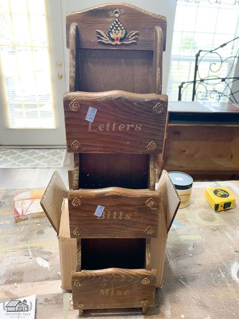 One of my favorite ways to save money is repurposing thrift store items to use as part of my home décor. Old wood mail sorters are an easy DIY project and can be found for cheap! Like this one, I repurposed a few months back. You can see it HERE.I found this one for $1.50. It was marked at $2.99 but it was the color of the day, so I scored it for 50% off. Even though it was outdated and had a few dings, it could still be saved! And what’s going on with those gold accents? Eeekk!   For… Wood Basket Decor Ideas, Thrift Repurpose, Vintage Repurposed Items, Mail Sorters, Thrift Store Diy Projects, Mail Sorter, Thrift Store Diy, Hand Painted Wallpaper, Color Of The Day