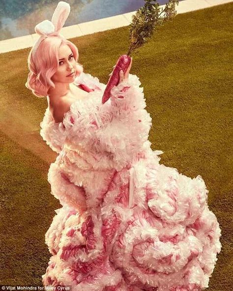 Miley Cyrus gets spanked by a VERY naughty bunny in racy Easter photo shoot | Daily Mail Online Miley Cyrus Easter, Easter Bunny Photoshoot, Easter Bunny Costume, Vogue Photoshoot, Easter Photoshoot, Miley Cyrus Style, Low Cut Dresses, Easter Photos, Pink Gowns