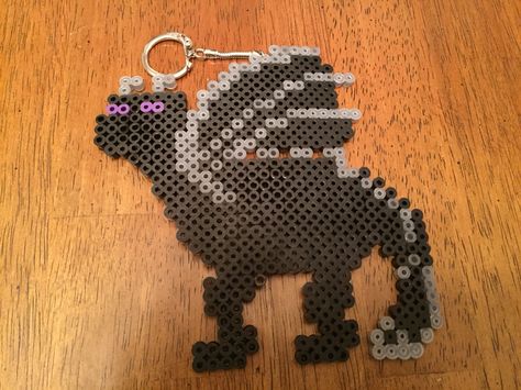 Minecraft ender dragon perler bead keychain Perler Bead Keychain, Minecraft Ender Dragon, Ender Dragon, Harley Quinn Halloween, Melty Bead Patterns, Bead Keychain, Beads Designs, Melty Beads, Iron Beads