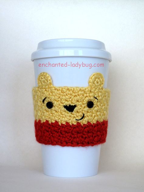 Free crochet winnie the pooh coffee cup cozy pattern. A crochet cozy pattern of one of Disney's most loved bears! Free crochet pattern download. Coffee Cup Cozy Pattern, Making Coasters, Crochet Cozies, Cup Cozy Crochet Pattern, Robin Movie, Cup Cozy Pattern, Coffee Cozies, Crochet Mug Cozy, Crochet Coffee Cozy