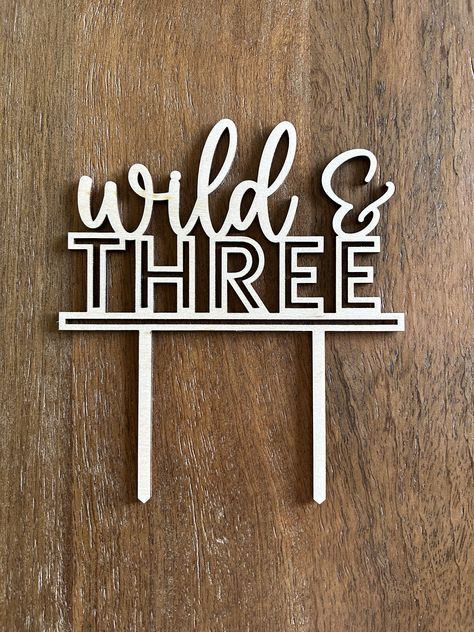 "This listing is for a wild and three cake topper. Topper measures 5\" wide and is cut from either plywood as shown or acrylic. See drop down menu to select. The perfect addition to your wild child's third birthday celebration!" Wild And Three, Young Wild And Three Birthday Boy, Wild Party Theme, Wild And Three Birthday Boy, Wild And Three Cake Topper, Wild And Three Cake, Three Cake Topper, Young Wild And Three Birthday, Third Birthday Boys