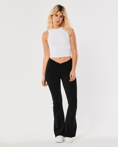 Women's Social Tourist V-Waist Leggings | Women's Bottoms | HollisterCo.com Hem Flare Pants, Hollister Leggings, Black Flares, Flared Leggings, Women's Bottoms, Flare Leggings, Soft Leggings, Split Hem, Cinched Waist