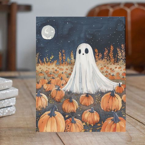 This Halloween card features a whimsical ghost in a pumpkin field under a starry sky. Perfect for autumn greetings and spooky fun. Handmade Stationary Each card features a high-quality print of the original artwork. Cards * folded with blank interiors * 4.25 by 5.5 inches in size * white cover stock * matching white envelopes ---------------------------------------------------------------------------------------------- IMPORTANT Shipping Details: We ship out orders on the same day or the next. O Halloween Painting Watercolor, Simple Halloween Watercolor, Halloween Cards Handmade Watercolor, Fall Halloween Watercolor, Halloween Watercolors, Autumn Cards Watercolor, Cute Fall Ghost Painting, Greeting Card Painting, Halloween Cards Handmade Ideas