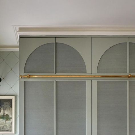 Polly Ashman Design on Instagram: "Joinery. Yes it can be expensive, but for a neat freak like me it’s top of my list when it comes to house design. These wardrobes were crafted by the amazing @rcjoinery and we worked with them to create arched profiles and grass cloth clad doors. The hanging rail not only looks lovely, it’s actually really useful. The woodwork is painted in @farrowandball #bluegrey to blend with the @ninacampbellltd wallpaper. And the handles are from the fab @biaseditions . #interiordesign #bedroomwardrobes #wardrobehangingrail" Polly Ashman, White Cottage, Hanging Rail, Closet Storage, Built Ins, Joinery, Peas, Blue Grey, Handles