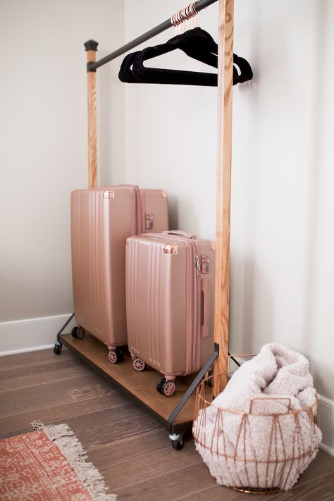 5 Tips For Hosting Overnight Guests Guest Bedroom Luggage Bench, Guest Room Luggage Rack, Suitcase Holder Guest Room, Guest House Room Ideas, Guest Room Robes, Diy Guest Bedroom Ideas, Guest Room Colorful, Guest Room Luggage Rack Ideas, Guest Bedroom Cart