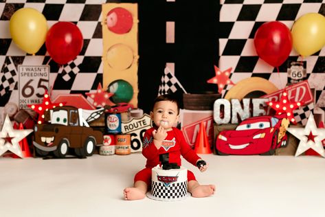 Boys first birthday car themed cake smash photoshoot Race Car Themed Photoshoot, Pixar Cars Birthday Photoshoot, Cars Birthday Photo Shoot Ideas, Lighting Mcqueen Photoshoot, Race Car 1st Birthday Photoshoot, Cars Smash Cake Disney, Cars Photoshoot Kids, Disney Cars Photoshoot, Lightning Mcqueen Smash Cake