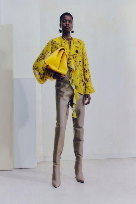 Victoria Beckham Pre-Fall 2023 Fashion Show | Vogue Victoria Beckham Collection, Pre Fall 2023, Knitted Tops, Career Wear, Traditional Fashion, Yellow Fashion, Mellow Yellow, Mode Vintage, Dress Cuts